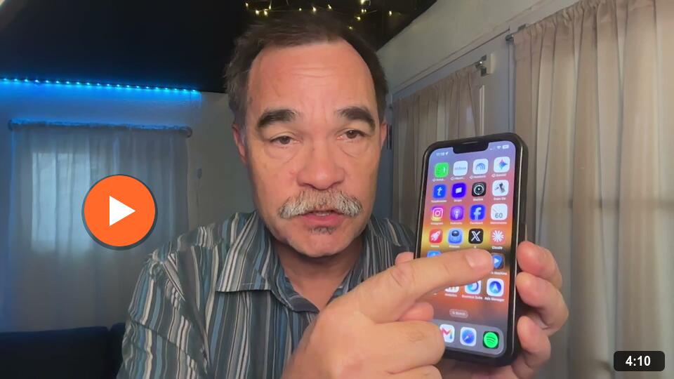 Play the video: Mash pointing at his phone, about to open Claude